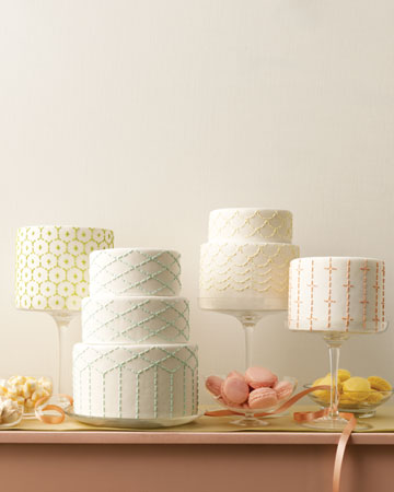I like the front threetier cake best photos from Martha Stewart Weddings 